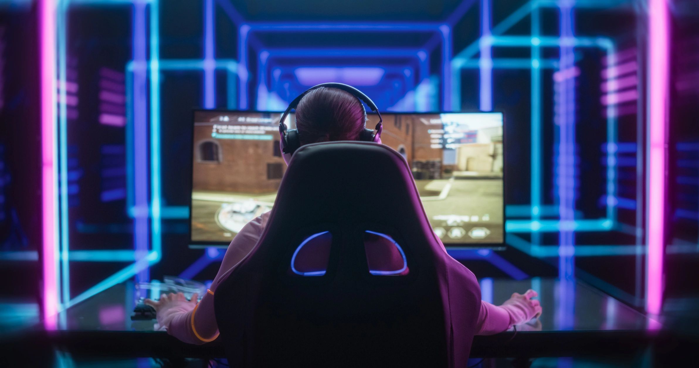 Female gamer reviewing in-game performance data.